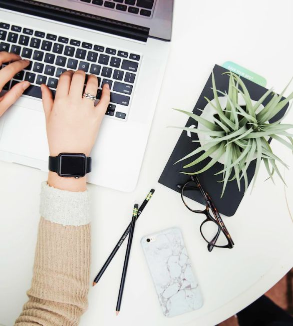 The girl is working on her laptop